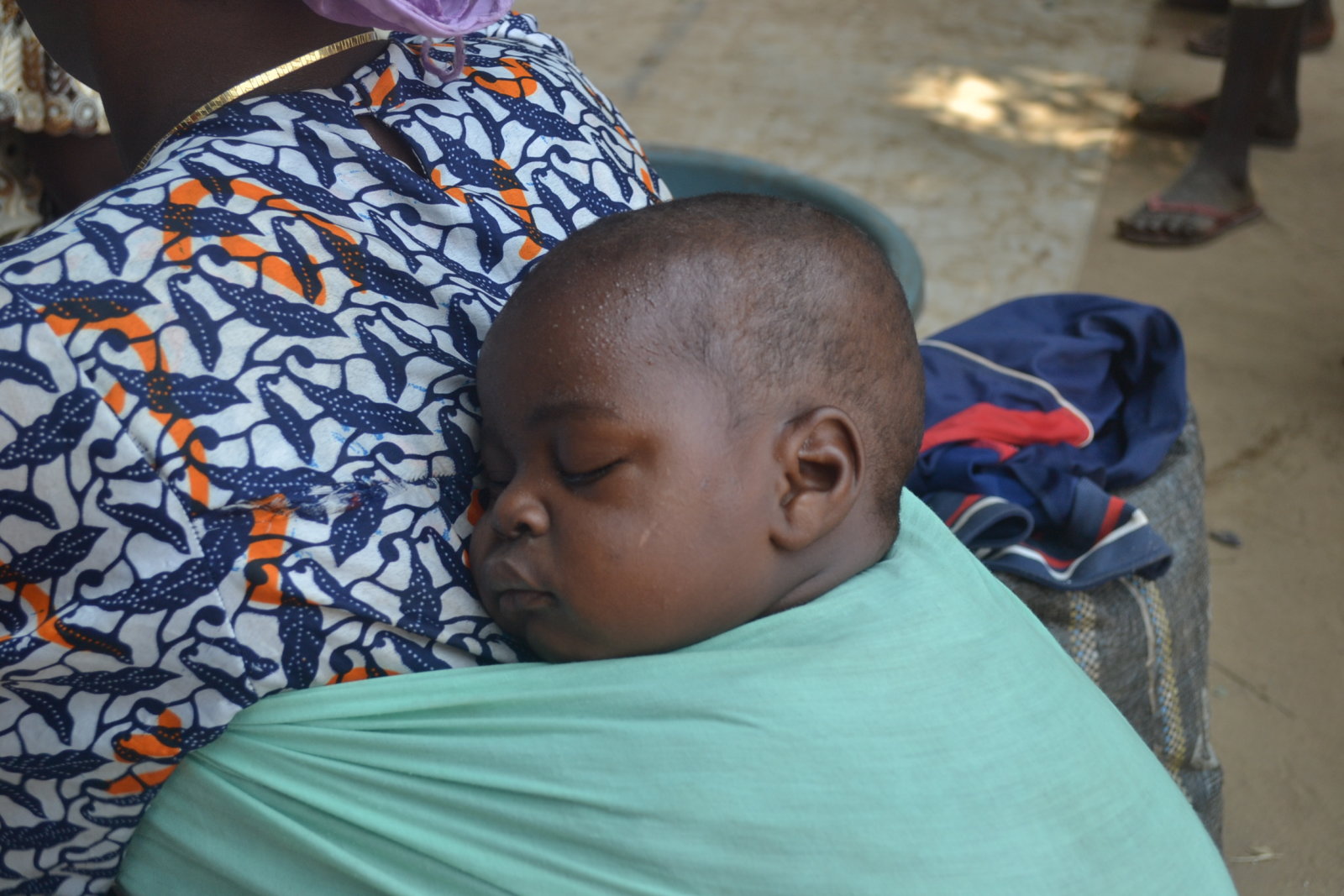 Child Sleeping During NIFs Distribution Centr Afrique February 2014