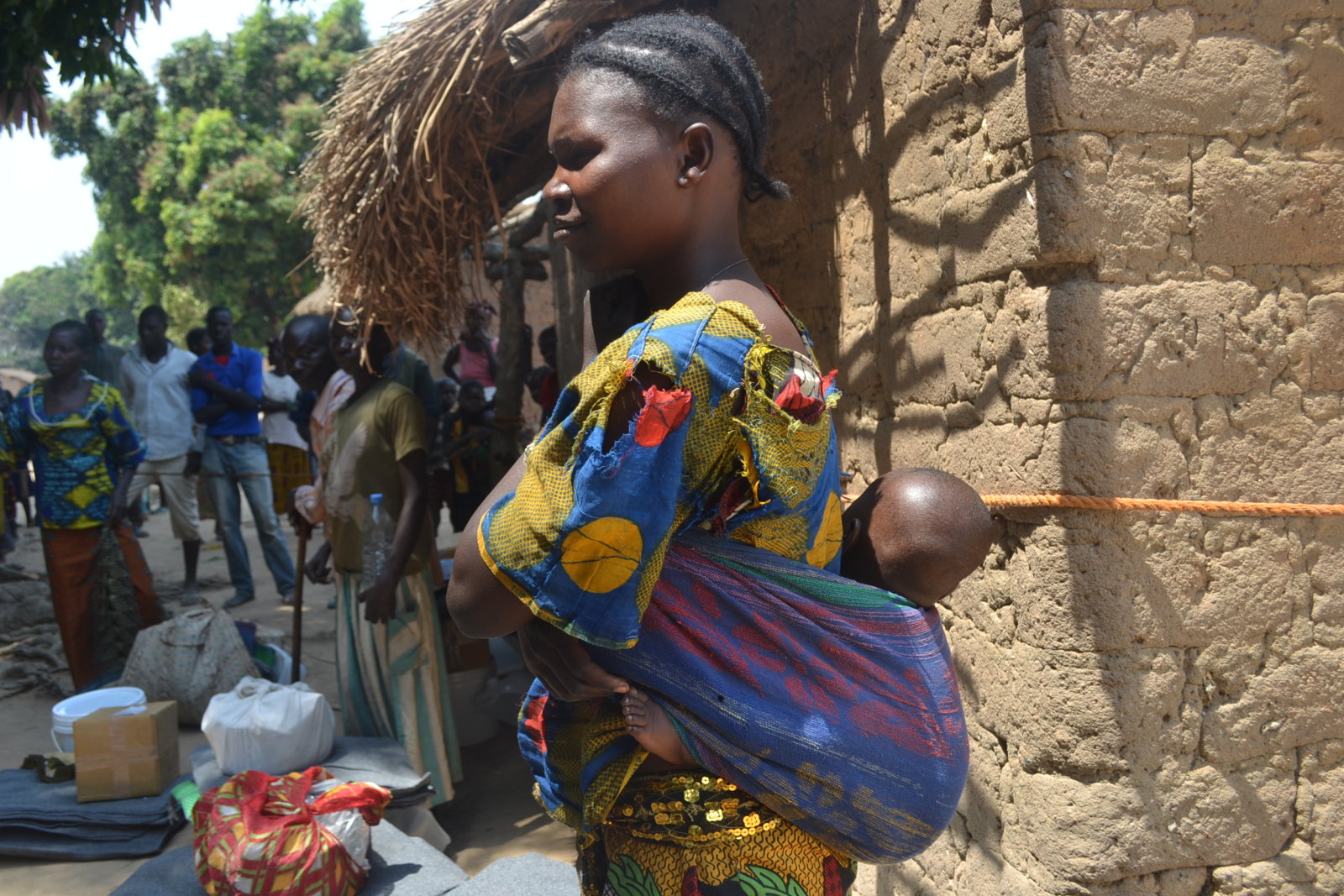 Mather And Child Waiting For None Food Item Distribution In Boferan Centr Afrique